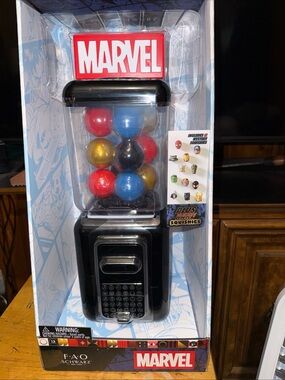 Marvel Dispenser w/12 Red, Blue, Gold, Black Capsules w/Mystery Squishies.